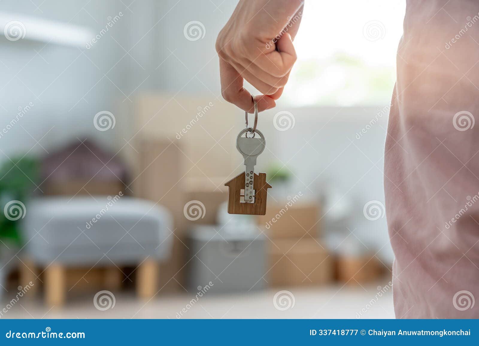 moving-house-relocation-woman-hold-key-keychain-new-apartment-move-home-buy-rent-real-estate-flat-tenancy-leasehold-property-337418777
